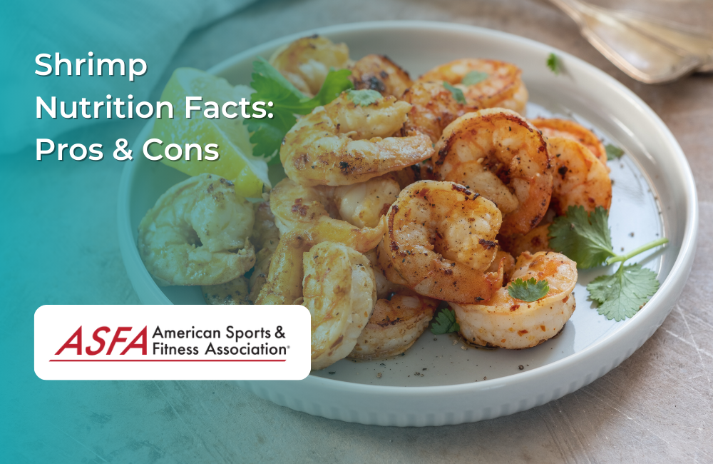 A plate of cooked shrimp with lemon and herbs.