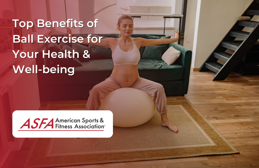 A pregnant woman sitting on an exercise ball with arms extended in a living room