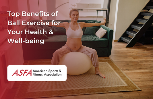 A pregnant woman sitting on an exercise ball with arms extended in a living room