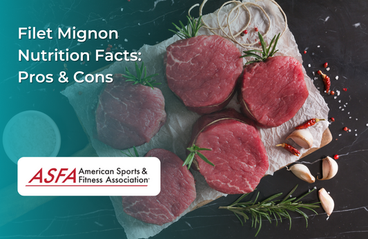 Several raw filet mignon cuts garnished with herbs and spices.