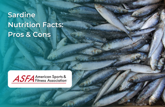 A pile of fresh sardines with shiny silver scales, arranged closely together.