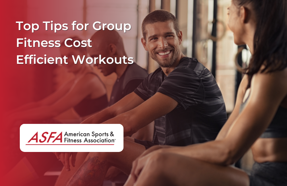 A group of 4 people sitting in a group fitness class. One man looking and smiling to the woman on his left. 