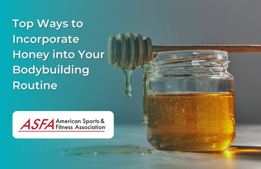 A jar full of honey with a honey dipper laid on top with honey dripping from it onto a white surface.