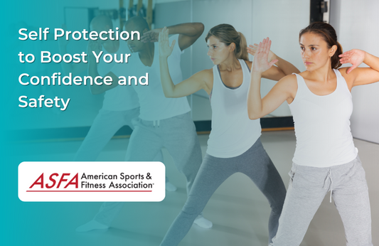 A group of four people in light colored workout clothes, practicing self defense inside.