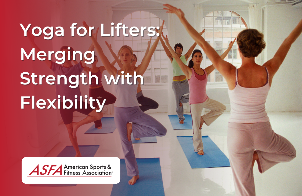 A group doing a yoga tree pose with their arms in a v in an indoor room